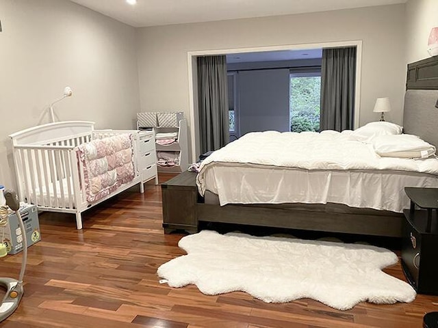 3426 Pepperhill Rd, Lexington, KY 40502 - bedroom featuring dark wood-style flooring and recessed lighting