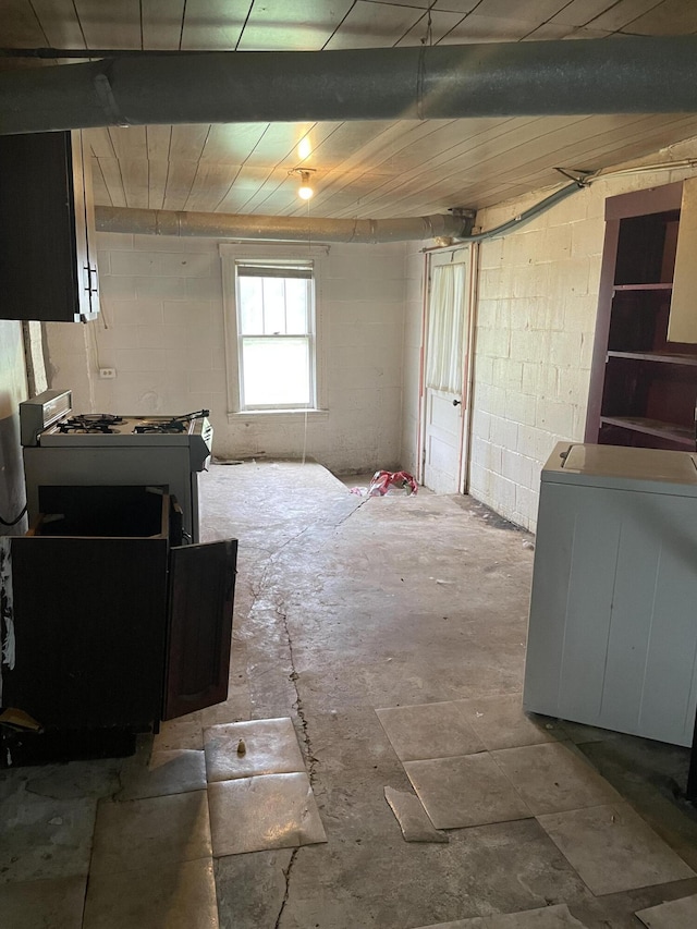 346 Slate Ave, Owingsville, KY 40360 - interior space featuring washer / dryer and concrete block wall