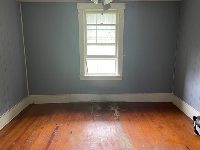 346 Slate Ave, Owingsville, KY 40360 - spare room featuring plenty of natural light, hardwood / wood-style flooring, and baseboards