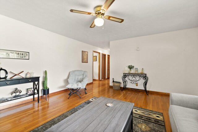 507 Holman Dr, Stanton, KY 40380 - living room with ceiling fan, wood finished floors, and baseboards