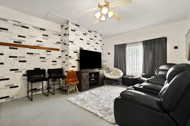507 Holman Dr, Stanton, KY 40380 - living area featuring finished concrete floors and a ceiling fan
