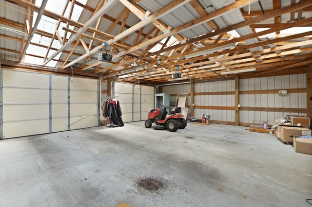 507 Holman Dr, Stanton, KY 40380 - garage featuring a garage door opener