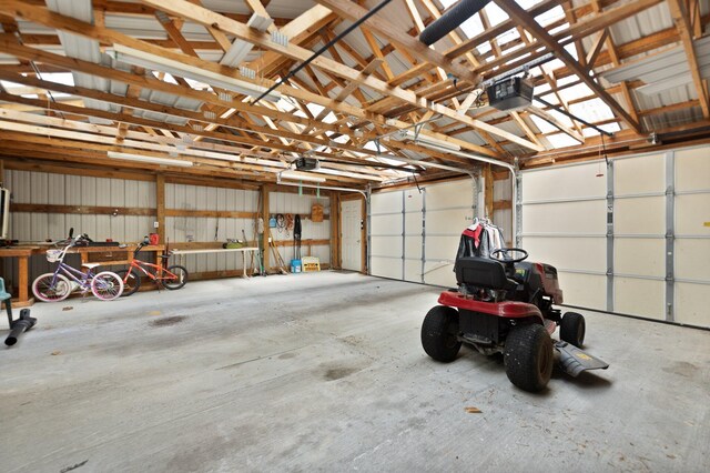 507 Holman Dr, Stanton, KY 40380 - garage featuring a garage door opener