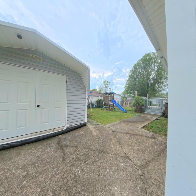 17 Jessica Way, Stanford, KY 40484 - view of patio / terrace featuring a playground, a shed, and an outbuilding