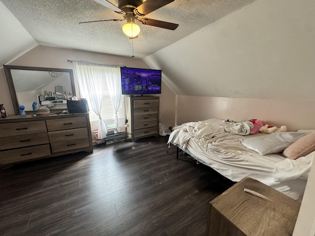 68 Red Witt Rd, Williamsburg, KY 40769 - bedroom with dark wood-type flooring, ceiling fan, a textured ceiling, and lofted ceiling