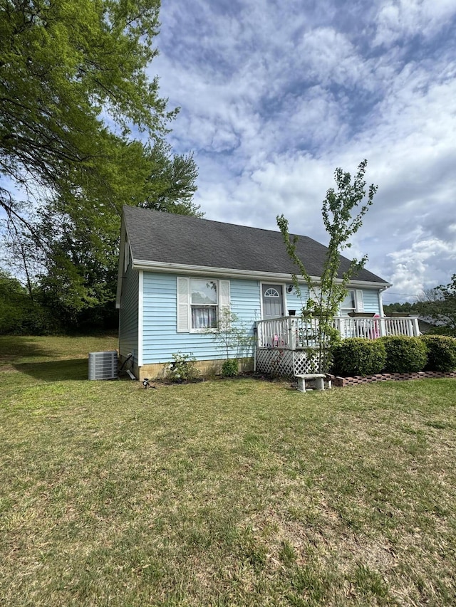 68 Red Witt Rd, Williamsburg, KY 40769 - bungalow-style house with a front yard, a deck, and central AC unit