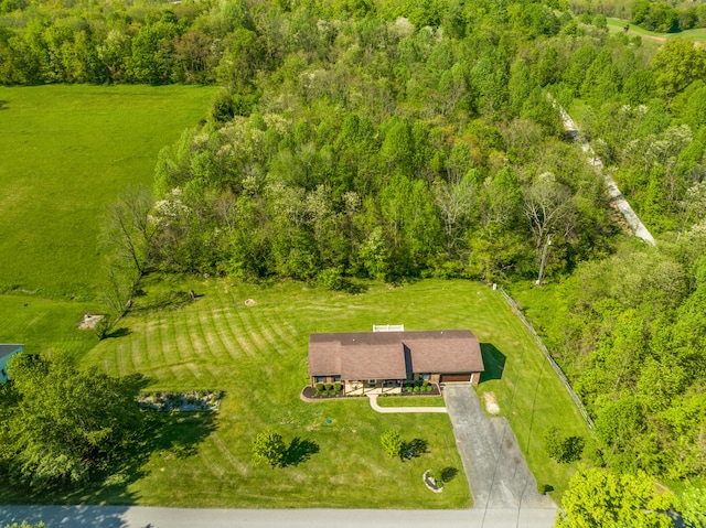 drone / aerial view with a view of trees