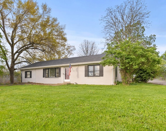 view of front of home with a front yard