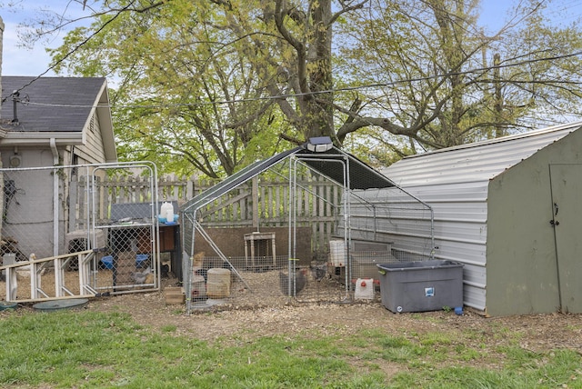 view of yard with an outdoor structure and exterior structure