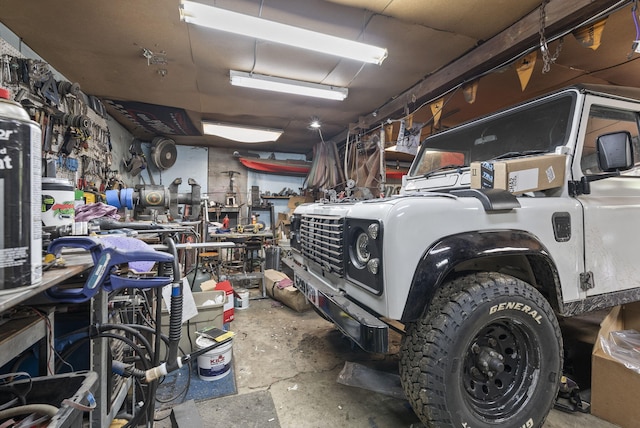 garage with a workshop area