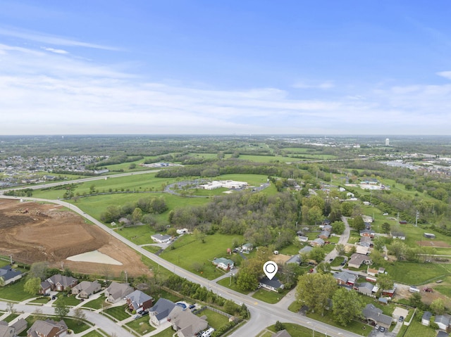 aerial view of property's location with nearby suburban area