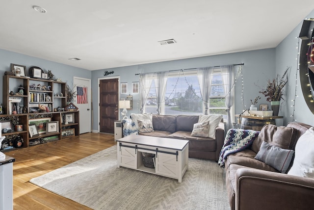 living room featuring light wood-type flooring