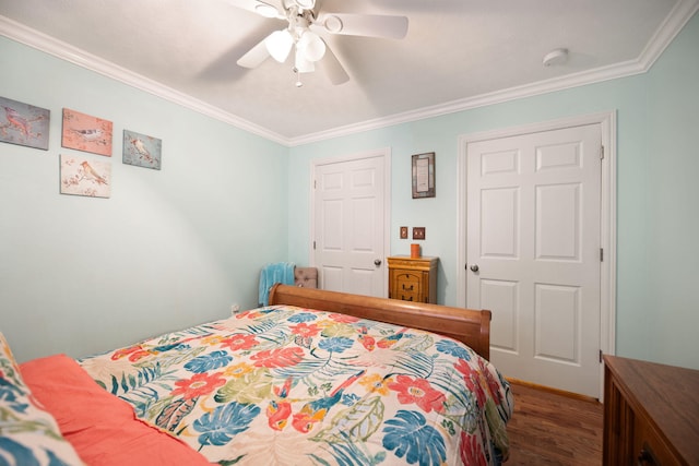 bedroom with ceiling fan, ornamental molding, and wood finished floors