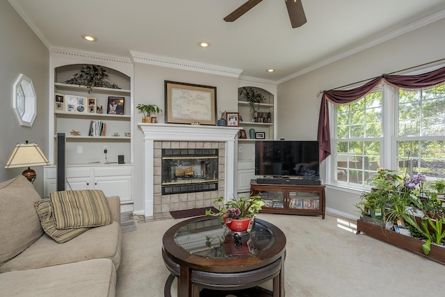 3120 Helmsdale Pl, Lexington, KY 40509 - carpeted living room with ornamental molding, a ceiling fan, baseboards, a tiled fireplace, and recessed lighting