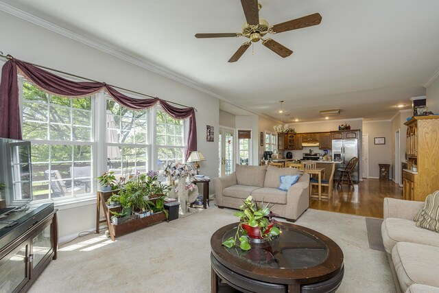 3120 Helmsdale Pl, Lexington, KY 40509 - living area with crown molding, ceiling fan, baseboards, and wood finished floors