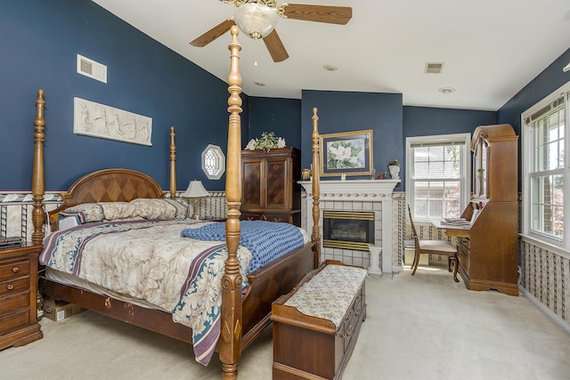 3120 Helmsdale Pl, Lexington, KY 40509 - bedroom featuring vaulted ceiling, light carpet, a tile fireplace, and baseboards