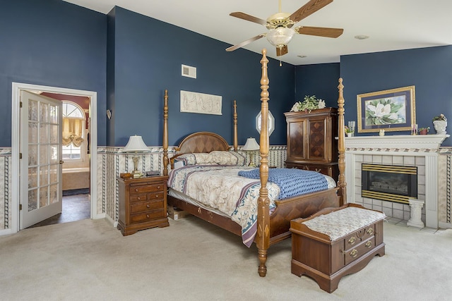 3120 Helmsdale Pl, Lexington, KY 40509 - bedroom with carpet flooring, a fireplace, connected bathroom, and ceiling fan