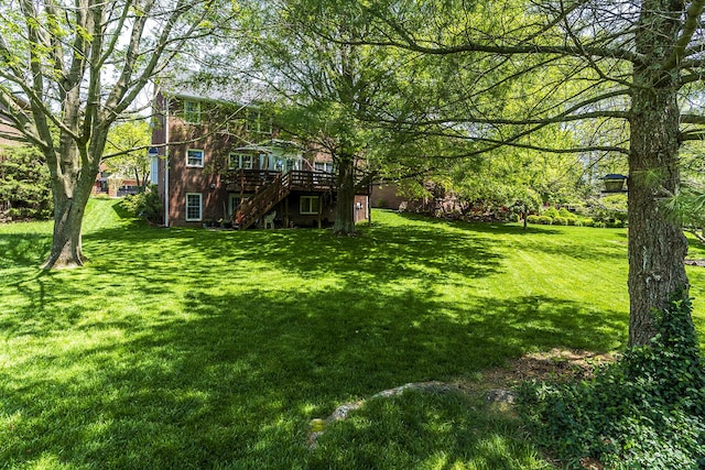 3120 Helmsdale Pl, Lexington, KY 40509 - view of grassy yard featuring stairs and a wooden deck