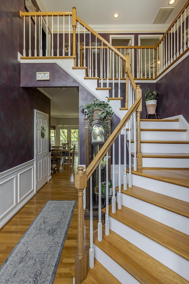 3120 Helmsdale Pl, Lexington, KY 40509 - staircase with wood finished floors, recessed lighting, and a decorative wall