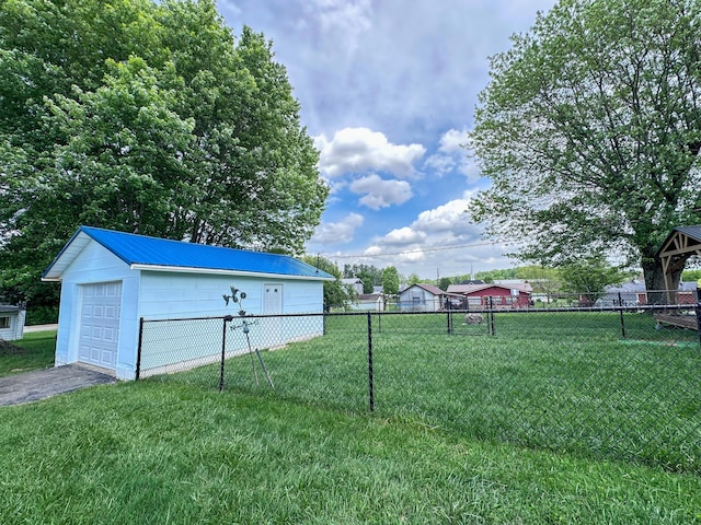 200 Summitt Ave, Somerset, KY 42501 - view of yard with fence, a detached garage, an outbuilding, and aphalt driveway