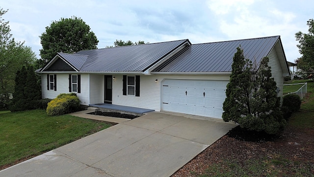 601 Heaton Ford Rd, Science Hill, KY 42553 - ranch-style house featuring a garage, covered porch, a front lawn, and metal roof