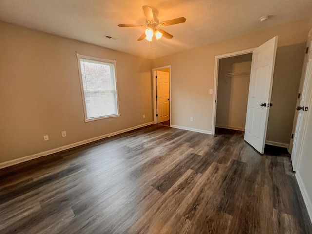 601 Heaton Ford Rd, Science Hill, KY 42553 - unfurnished bedroom with a ceiling fan, baseboards, visible vents, dark wood-style floors, and a closet
