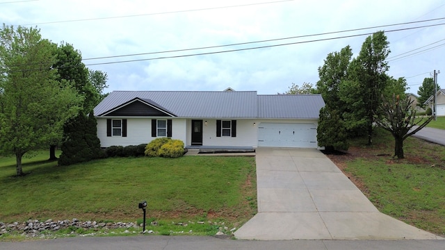 601 Heaton Ford Rd, Science Hill, KY 42553 - single story home with an attached garage, driveway, metal roof, and a front yard