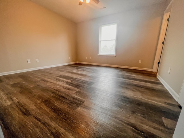 601 Heaton Ford Rd, Science Hill, KY 42553 - unfurnished room with dark wood-type flooring, baseboards, ceiling fan, and visible vents