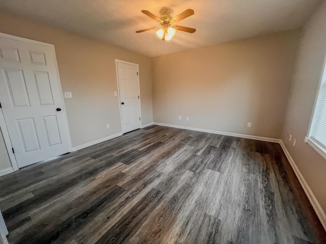 601 Heaton Ford Rd, Science Hill, KY 42553 - spare room with baseboards, a ceiling fan, and dark wood-type flooring