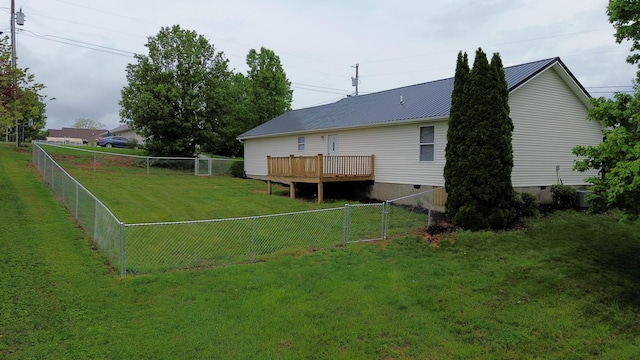 601 Heaton Ford Rd, Science Hill, KY 42553 - rear view of property with a wooden deck, crawl space, a fenced backyard, a yard, and metal roof