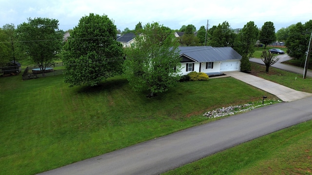 601 Heaton Ford Rd, Science Hill, KY 42553 - single story home with an attached garage, driveway, a front lawn, and metal roof