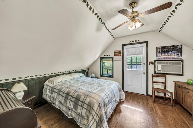 bedroom with cooling unit, a ceiling fan, wood finished floors, and lofted ceiling