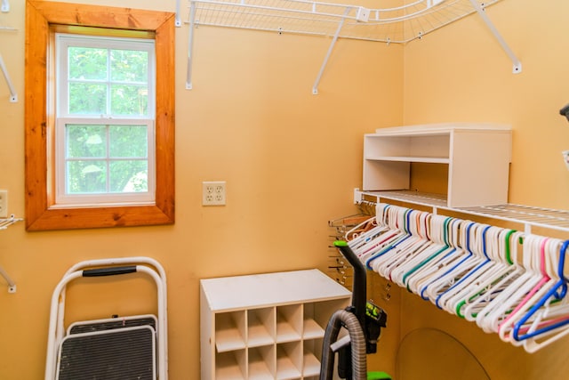 spacious closet featuring heating unit