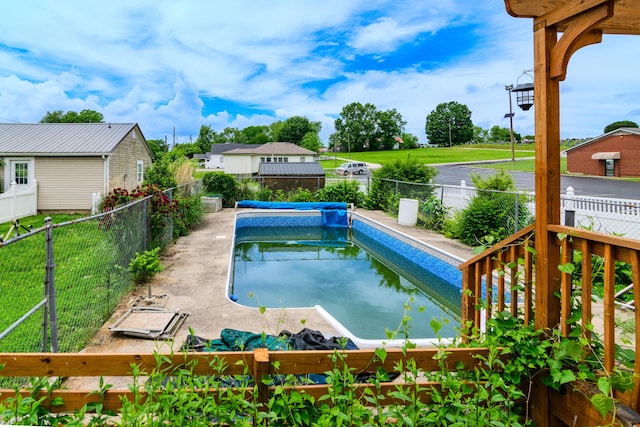 view of pool featuring a fenced backyard