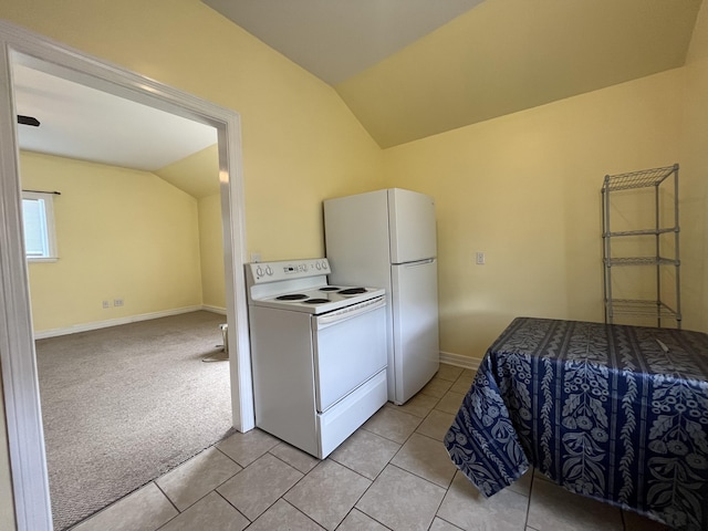 245 Cedar Grove Rd, Irvine, KY 40336 - kitchen featuring white appliances, vaulted ceiling, light tile patterned floors, and baseboards