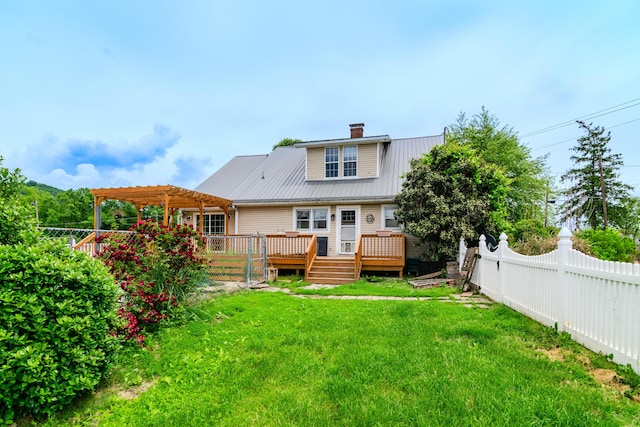 back of house with a pergola, a deck, a chimney, and metal roof