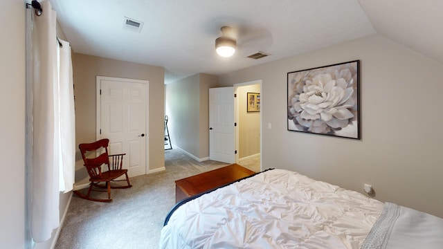 carpeted bedroom with visible vents, ceiling fan, and baseboards