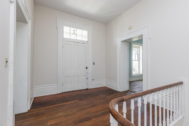 foyer featuring plenty of natural light and hardwood / wood-style floors