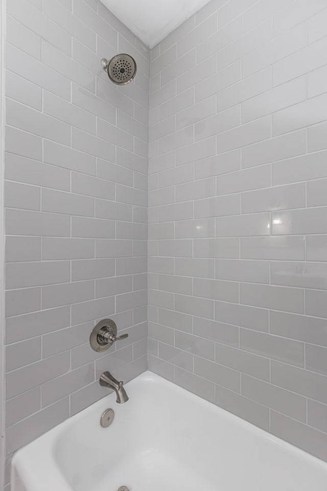 bathroom with shower / bathtub combination