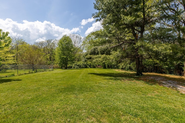 view of yard with fence