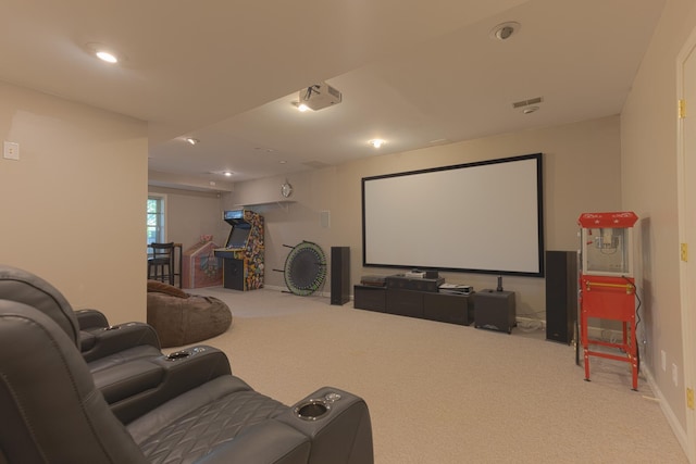 home theater with baseboards, recessed lighting, and carpet
