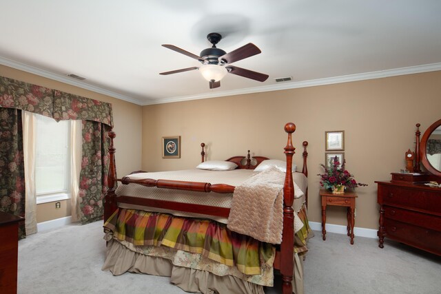 bedroom with visible vents, carpet, baseboards, and crown molding