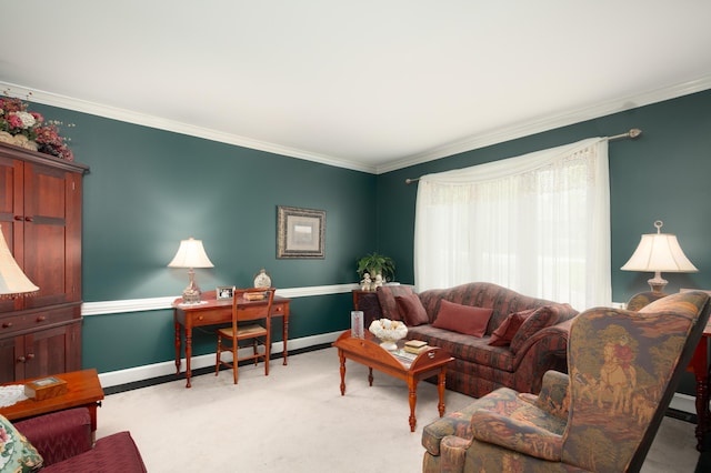 carpeted living area with crown molding and baseboards