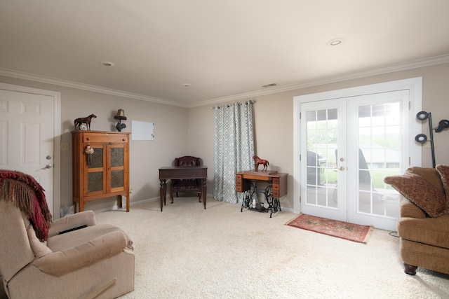sitting room featuring ornamental molding, french doors, carpet flooring, and visible vents