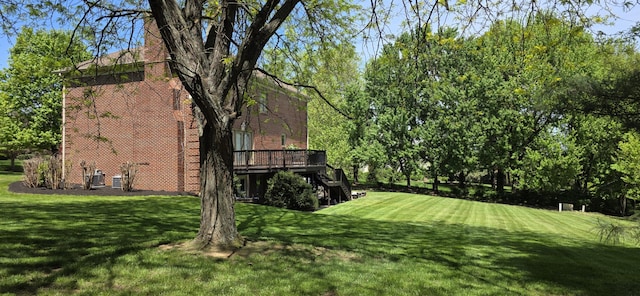 view of yard with a deck