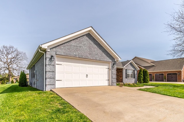 ranch-style home featuring a front lawn, driveway, an attached garage, and brick siding