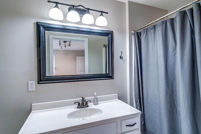 bathroom featuring vanity and a shower with curtain
