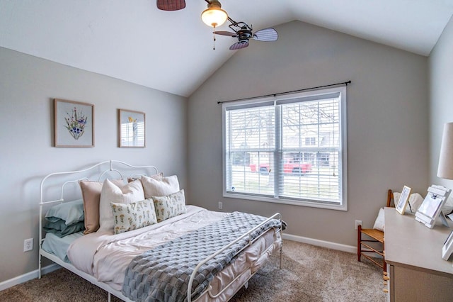 bedroom with light carpet, lofted ceiling, and baseboards