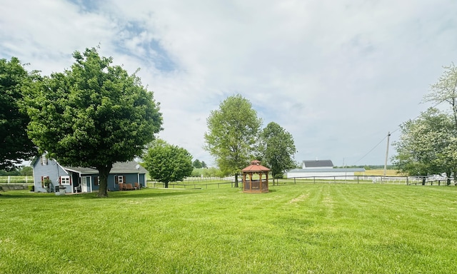 view of yard featuring a gazebo and fence