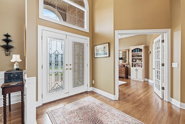 204 Helmsley Ln, Versailles, KY 40383 - entrance foyer featuring french doors, wood finished floors, and a high ceiling